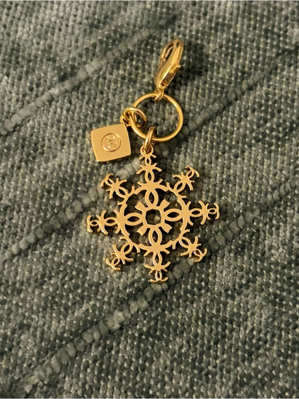 CHANEL Gold Snowflake Logo Charm
